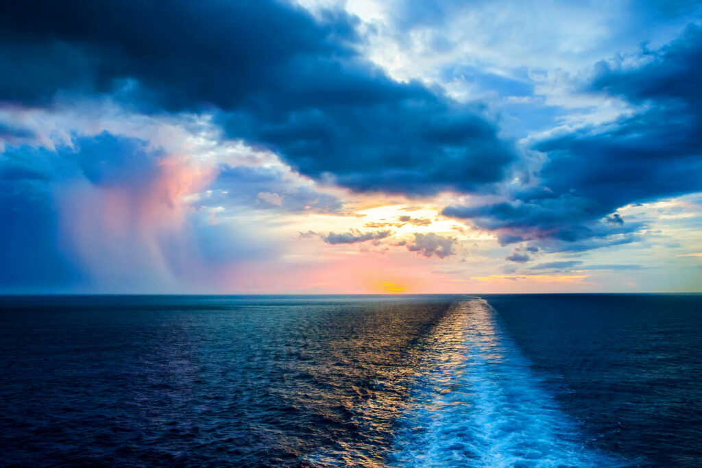 Sunset Serenade: Majestic Atlantic Ocean Horizon in HD Sky Background Wallpaper