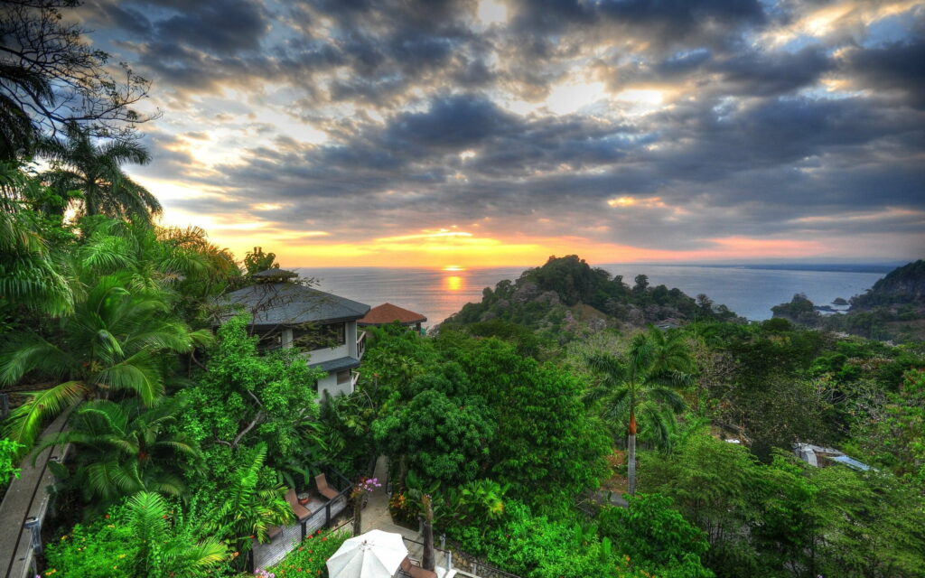 Costa Rican Coastal Spectacle: Sunsets over the Jungle Wallpaper
