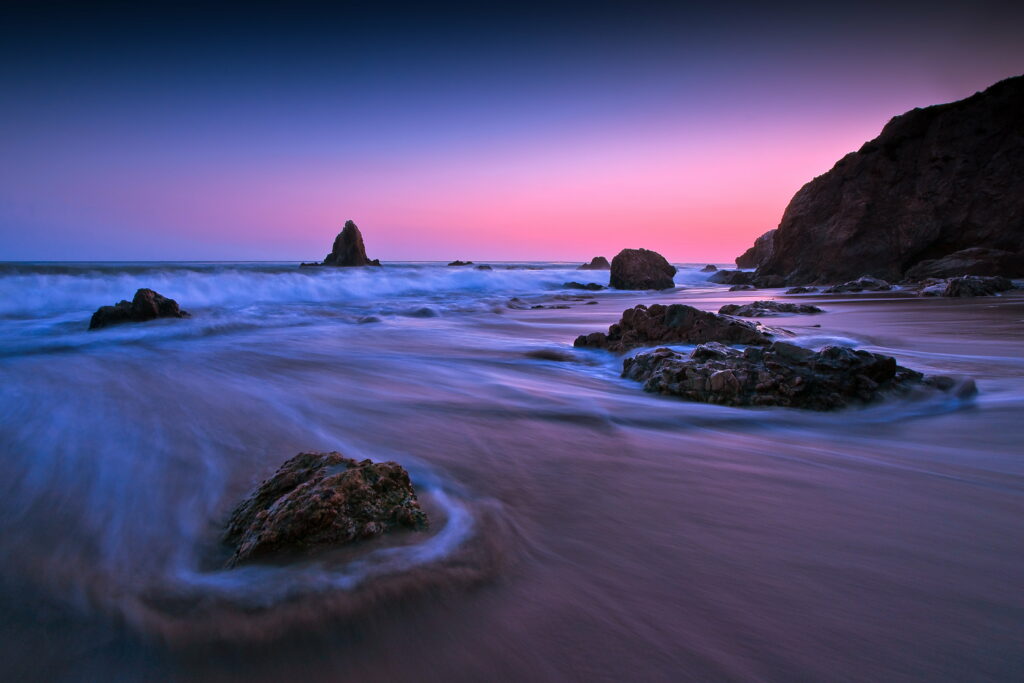 Serenity Unleashed: Majestic Sunset over Ocean Rocks - HD wallpaper background photo
