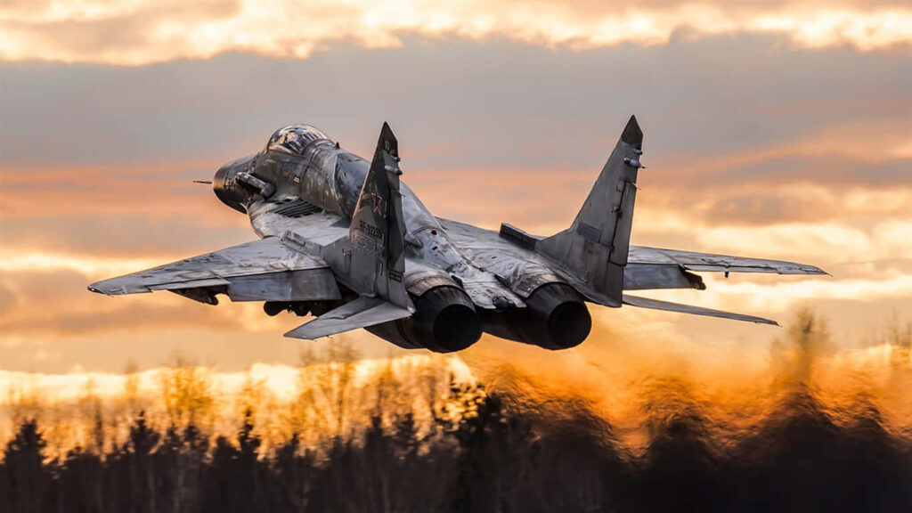 Magnificent MIG-29: Soaring into Sunset Skies Wallpaper