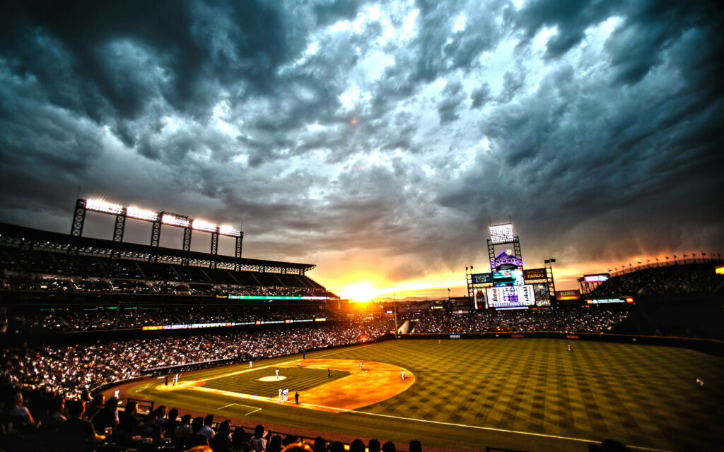 Sunset Glory: A Captivating Baseball Stadium Wallpaper