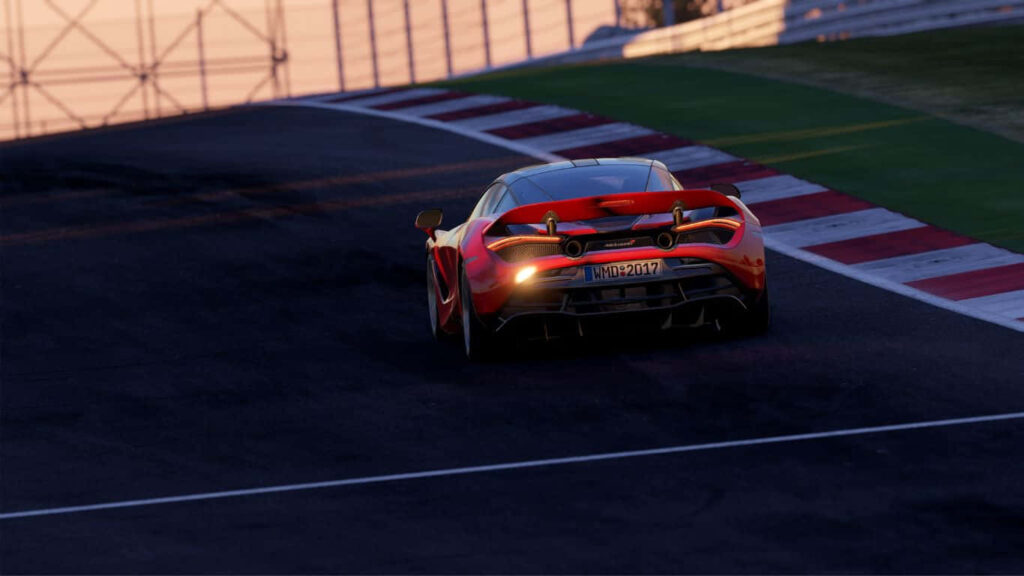 Sleek sports car racing solo on sunset circuit in Project Cars 2 high speed wallpaper background