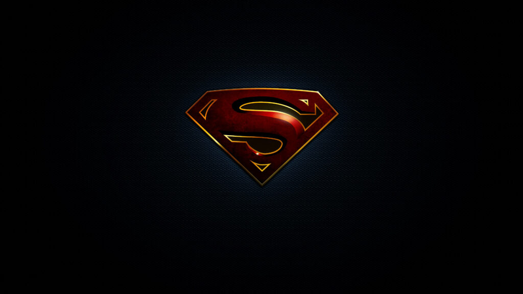 Embossed Heroism: A Dark and Vibrant Superman Logo Desktop Wallpaper