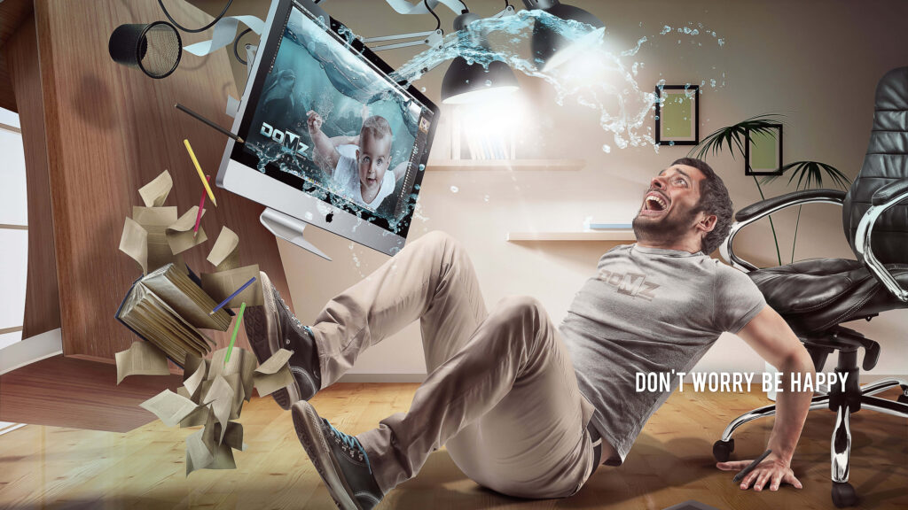 Man sitting on wooden floor in modern room with floating monitor water splash and scattered books Wallpaper