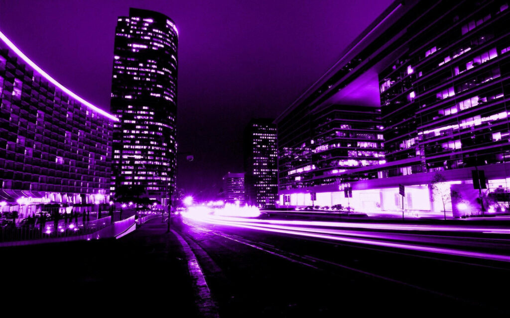 Urban Twilight: Embracing the Enigmatic Charms of a City Under Dark Purple Hues Wallpaper