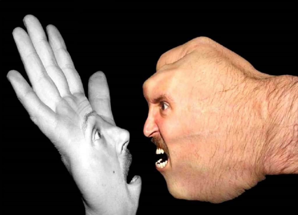 Surreal wallpaper with shocked face on open palm confronting angry face on clenched fist black background