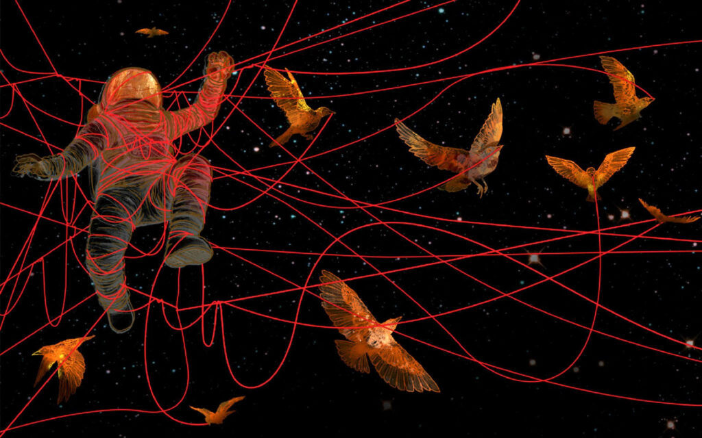 Surreal Space Wallpaper: Astronaut Entangled in Vivid Red Strings