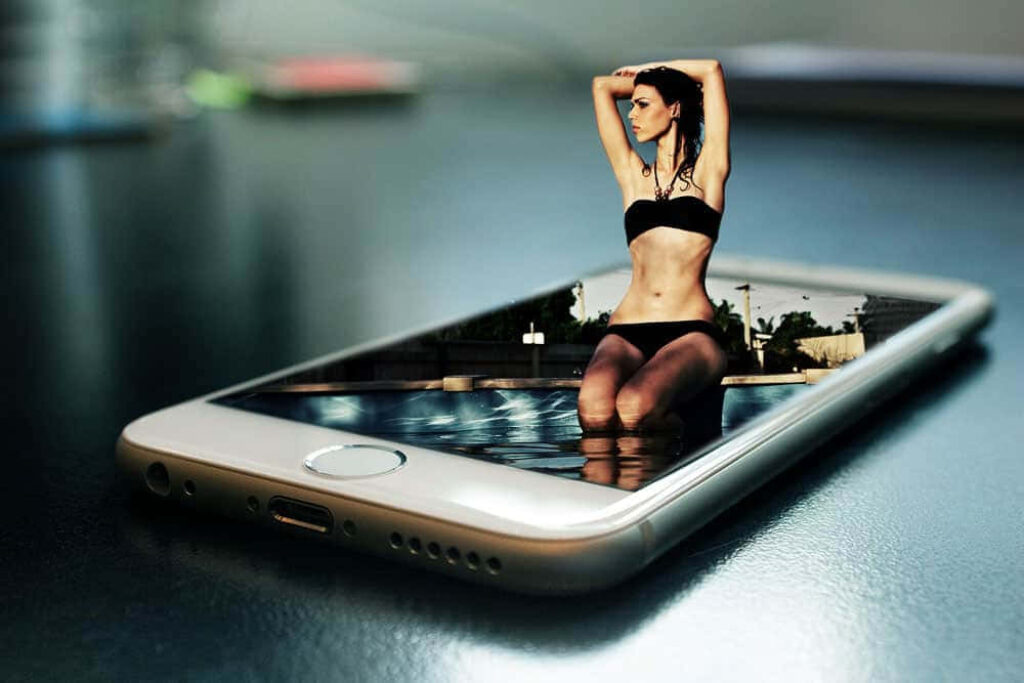 Surreal Wallpaper: Woman in Swimwear Emerging from Smartphone