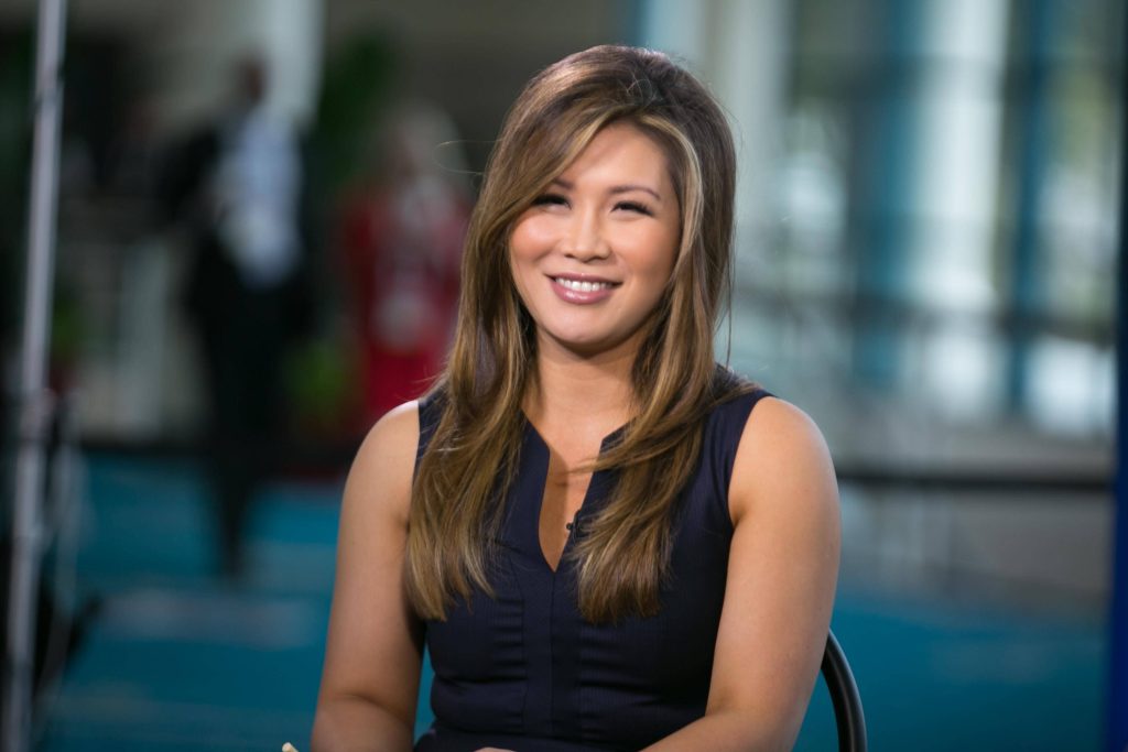 Susan Li Fox Business news anchor smiling in navy top bright modern studio HD portrait wallpaper