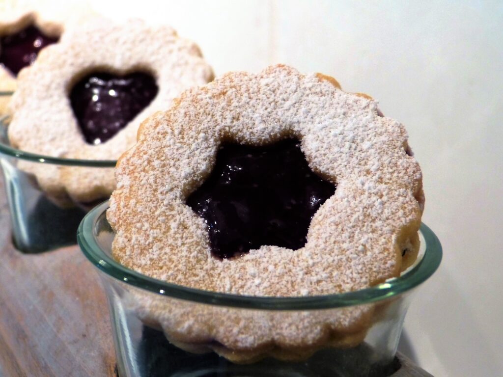 Delicious Jam-Filled Biscuits with Powdered Sugar - Sweet Wallpaper