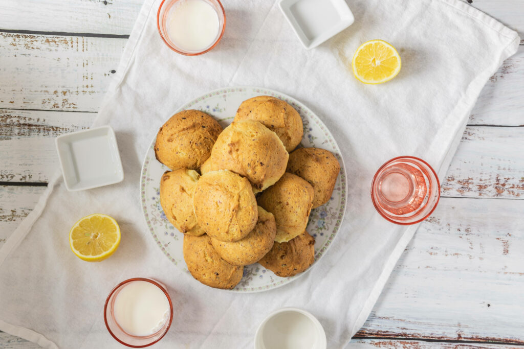 Savoury Delights: Indulging in a Cookie Feast with Refreshing Milk and Lemons Wallpaper