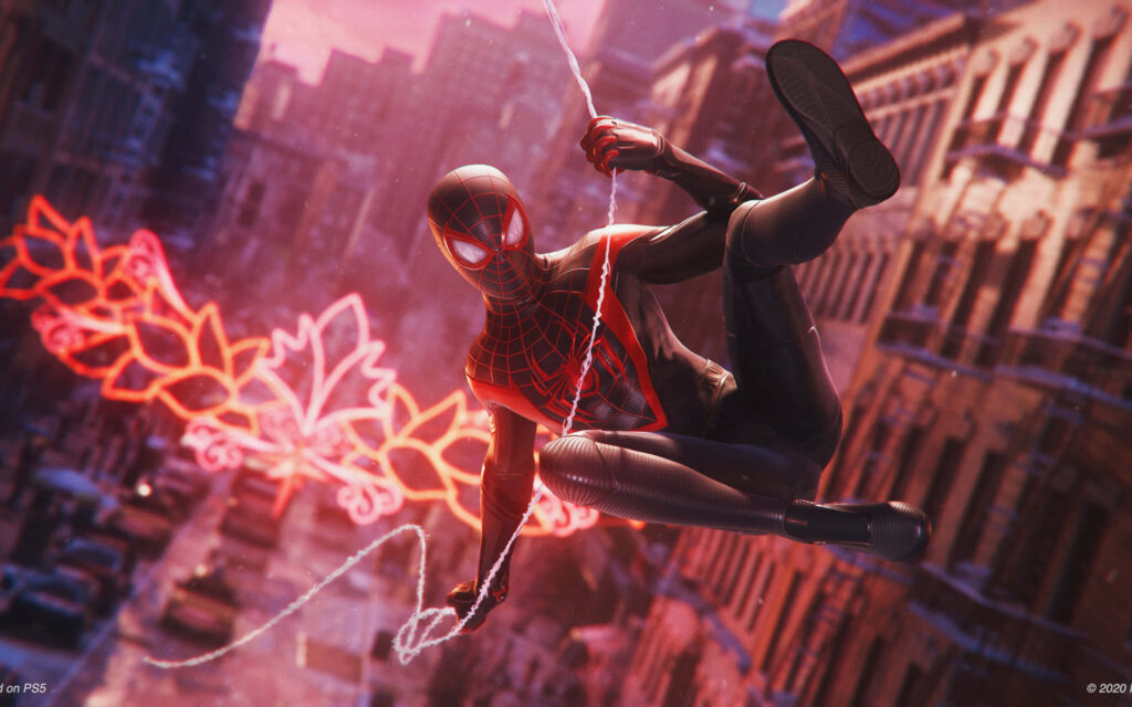 Web-Slinging Spectacle: Spider-Man Swings High Above the Urban Landscape in this Captivating Profile Picture Wallpaper