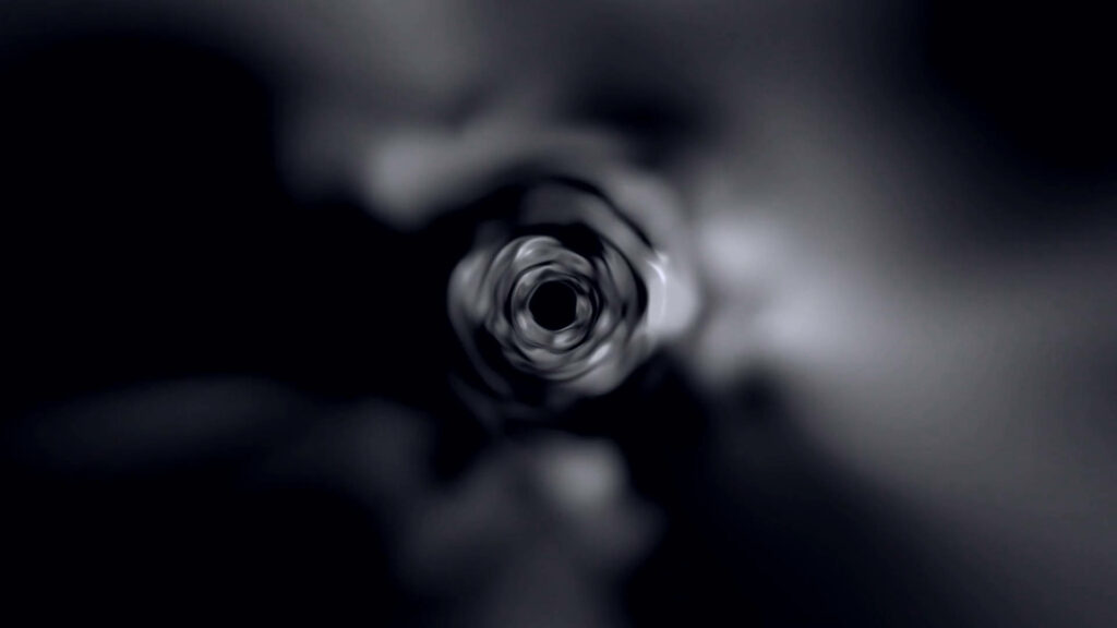 Captivating Black-and-White Vortex Wallpaper: Mysterious Background Design