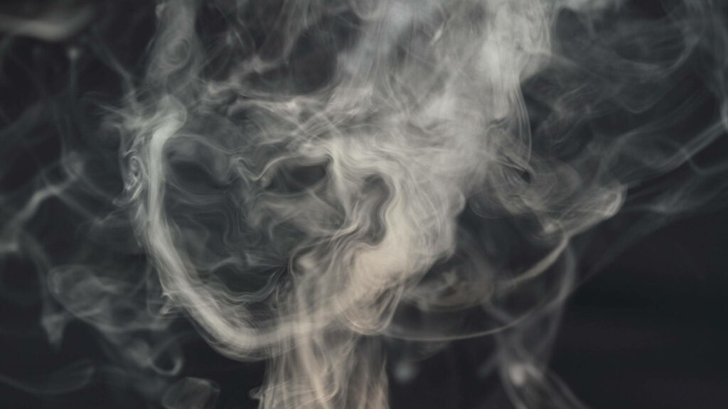 Ethereal Swirling Smoke Wallpaper: Mystical Dark Background Art