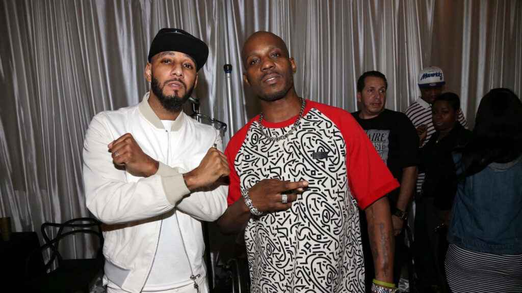 Swizz Beats in white jacket and DMX in patterned shirt with red sleeves hip hop wallpaper background