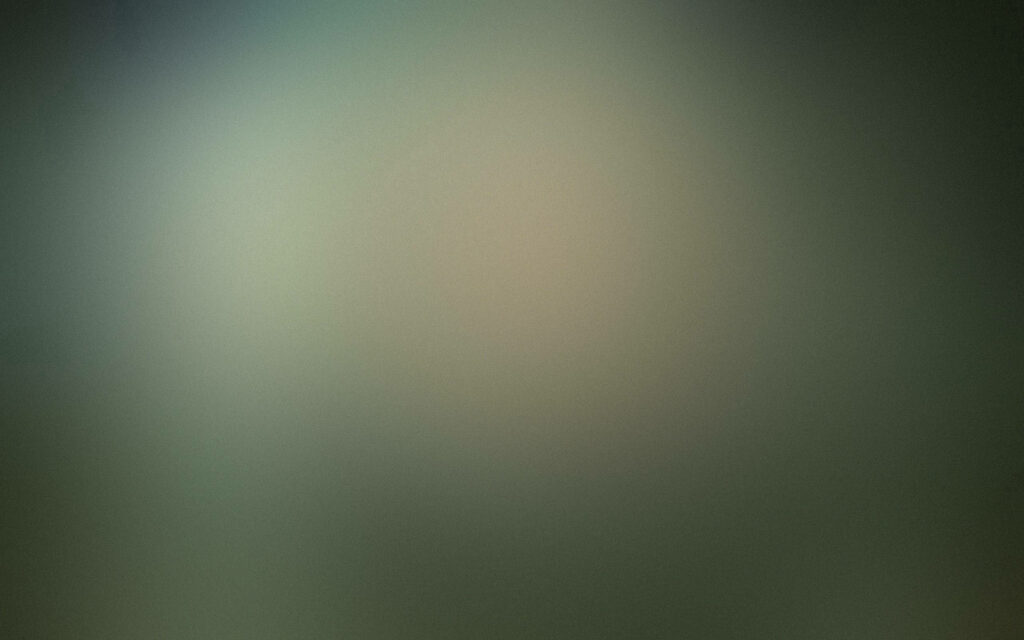Symmetrical Serenity: A Blurry Gray Solid Color Wallpaper