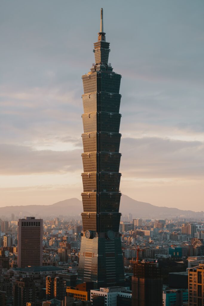 Taipei 101 Wallpaper: Iconic Skyscraper in Serene Cityscape
