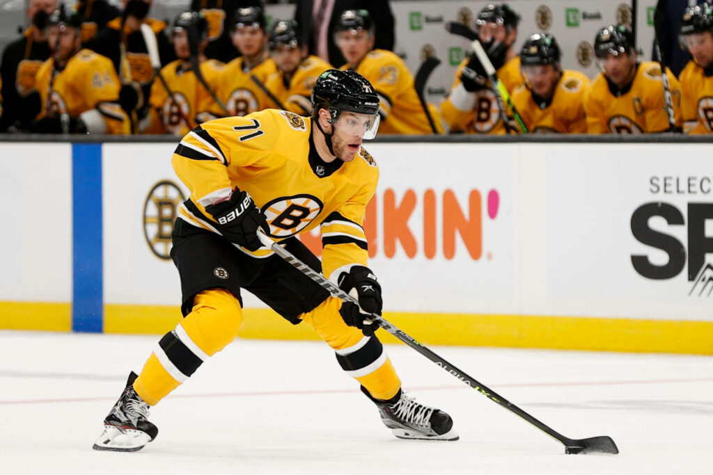 Taylor Hall Boston Bruins Left Winger No 71 in action on ice high energy hockey wallpaper