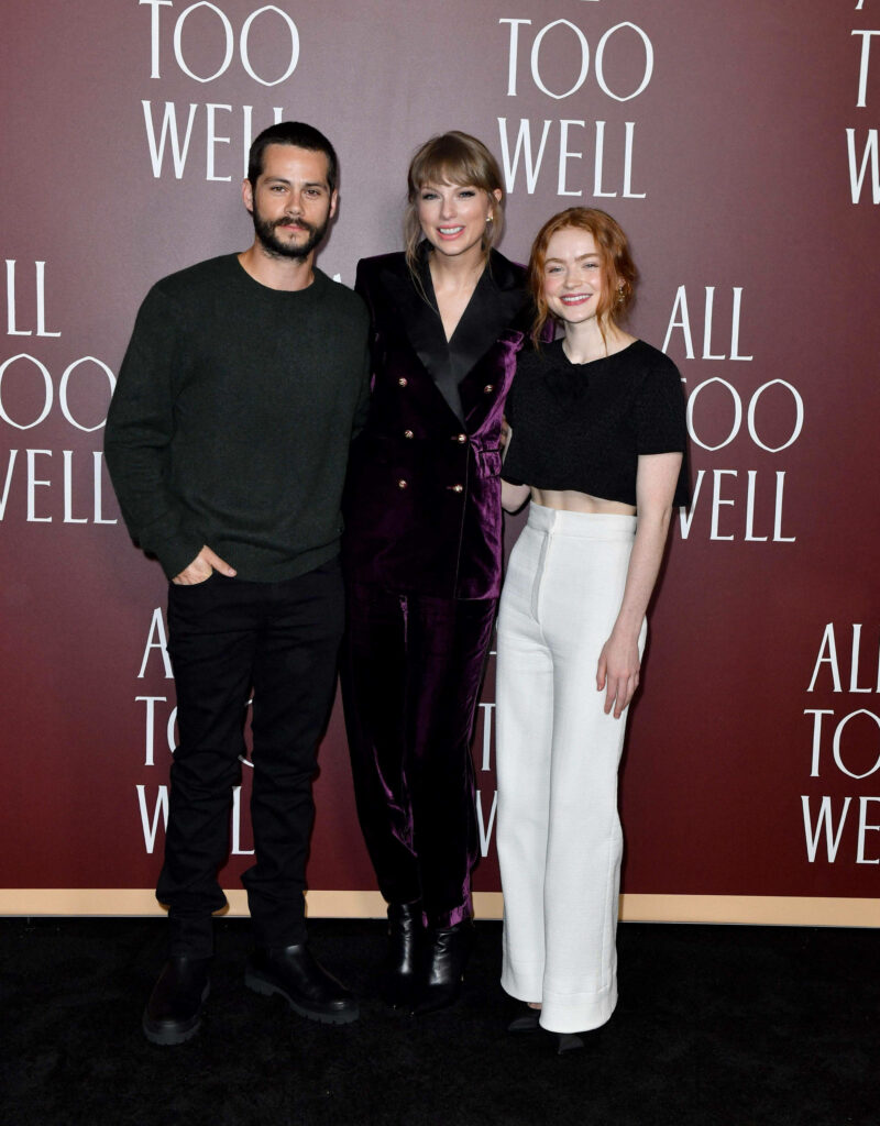 Taylor Swift Dylan O'Brien Sadie Sink at All Too Well The Short Film premiere maroon backdrop Wallpaper