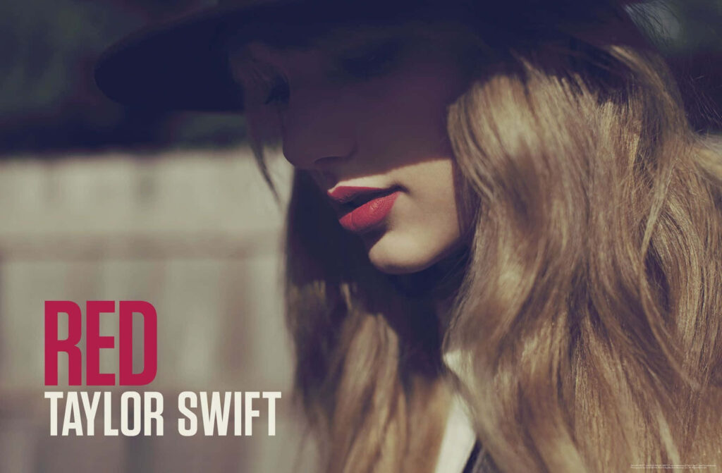 Taylor Swift moody portrait with bold Red text capturing her re recorded Red album wallpaper