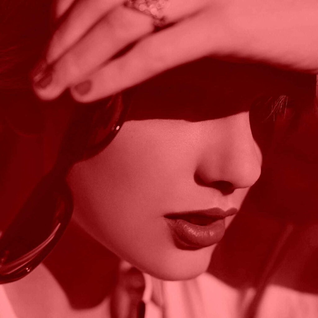 Taylor Swift dramatic red portrait inspired by Red Taylor’s Version album cover vibrant wallpaper
