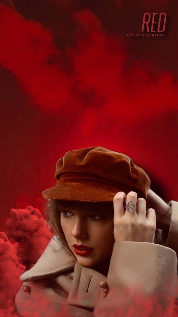 Taylor Swift in red utility cap beige coat with vibrant red clouds Red Taylor's Version wallpaper background