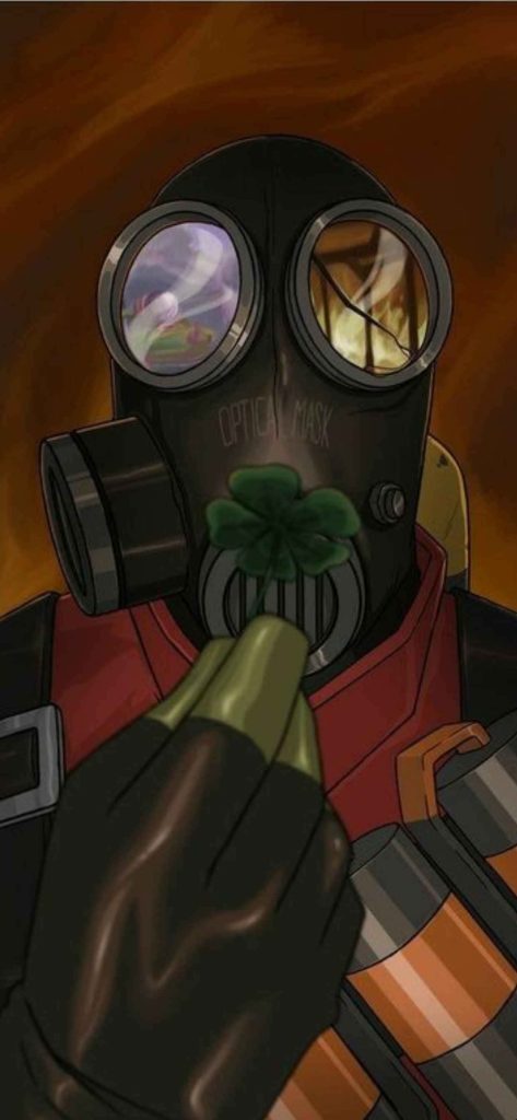 Team Fortress 2 Pyro in Optical Mask holding four-leaf clover with fire reflections wallpaper