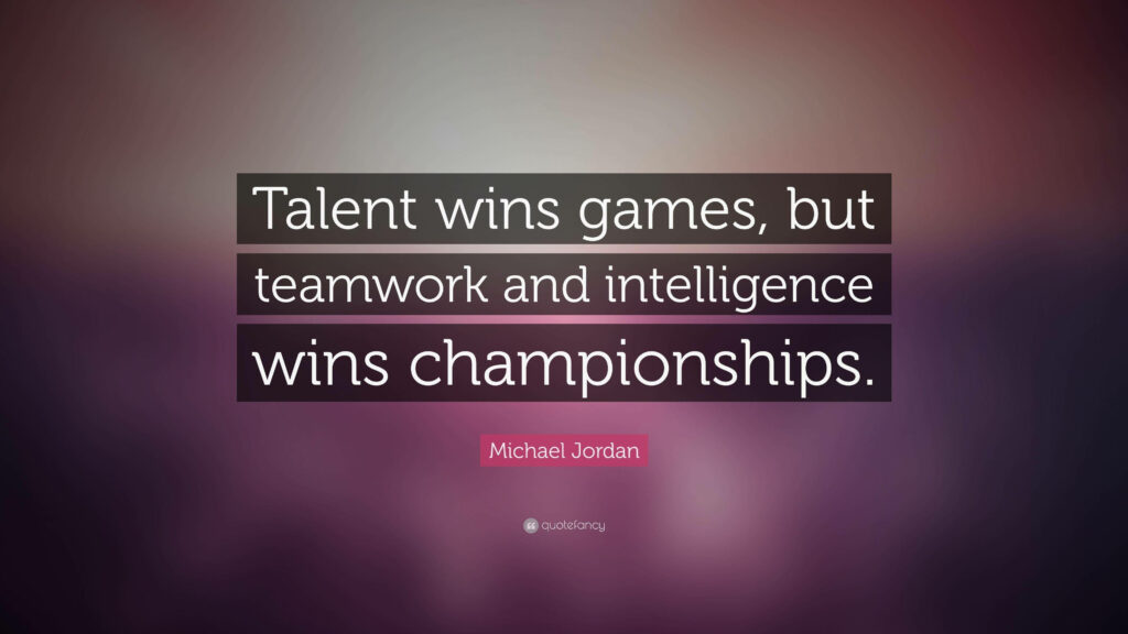 Michael Jordan's Words on Teamwork Against a Blurred Aesthetics Background Wallpaper