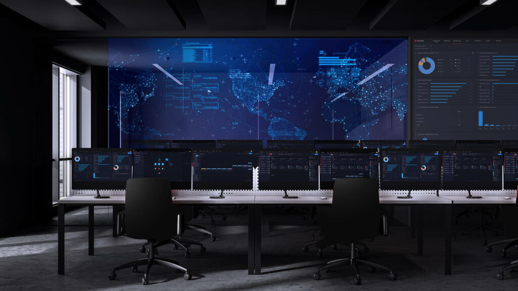 Futuristic Security Operations Center with high-tech workstations and global data wall display wallpaper