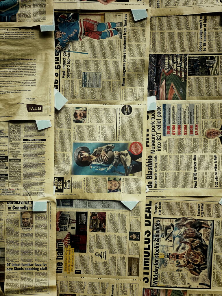 Digitally-Inspired News: A Tech-Savvy snapshot of Print Media on Antique Furniture Wallpaper