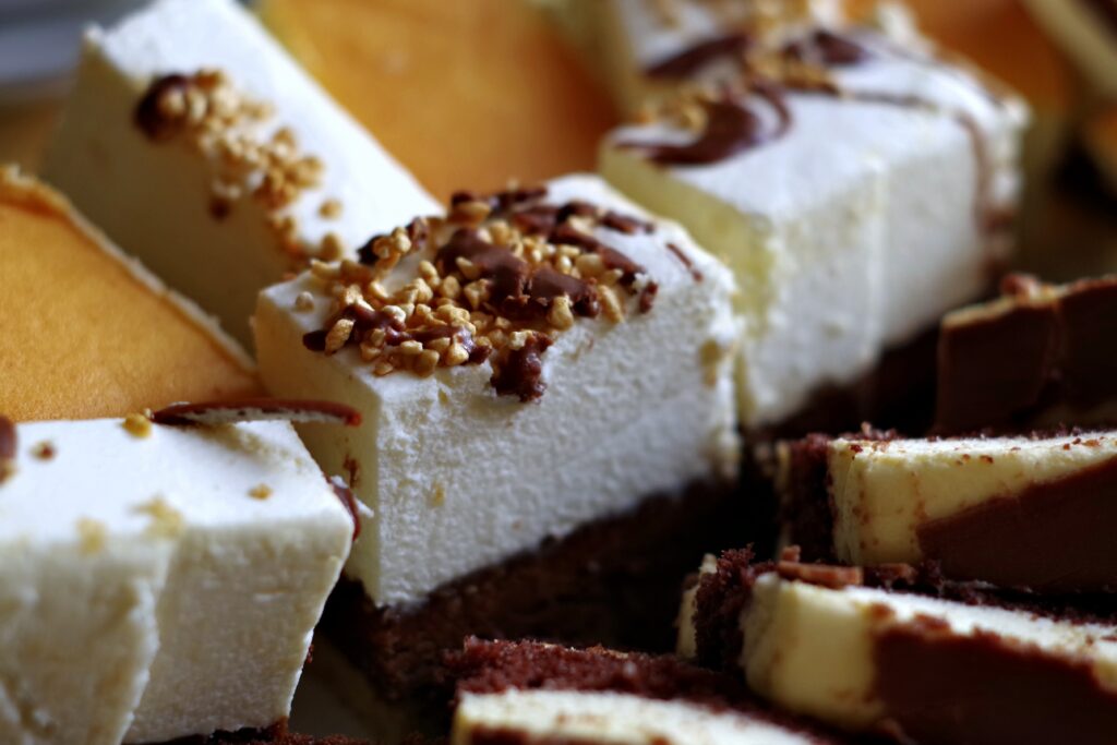 Indulgent Dessert Wallpaper: Creamy Pastries & Rich Treats Background