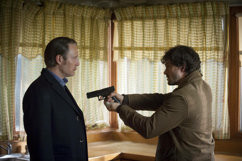 Hannibal Lecter: Tense Confrontation in Dramatic Wallpaper Scene