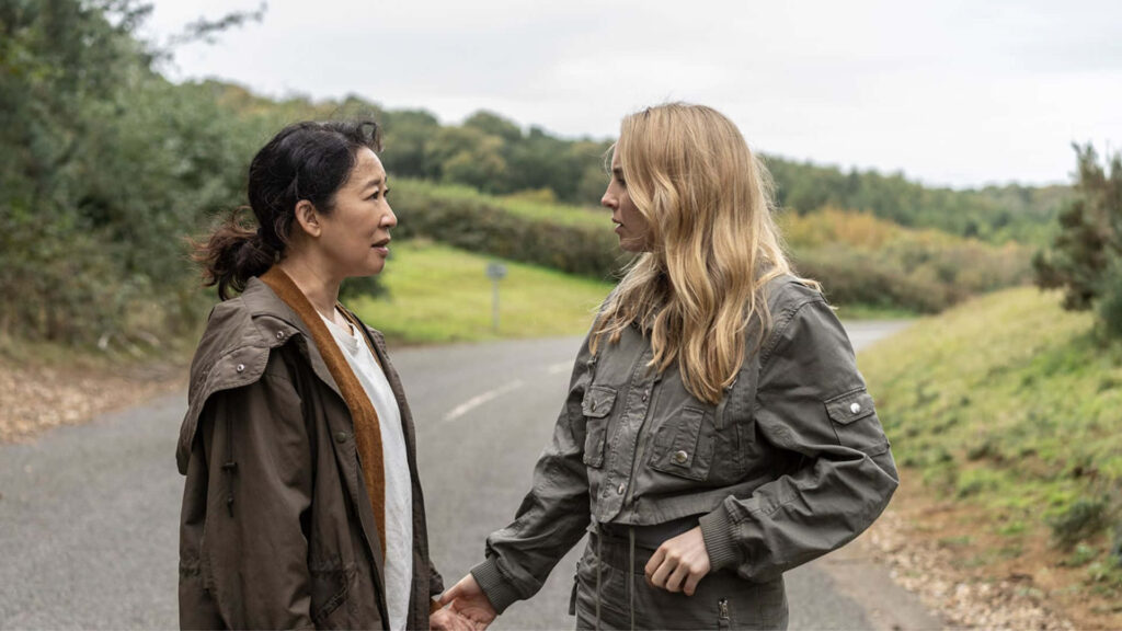 Tense Confrontation on Deserted Road: Killing Eve Wallpaper