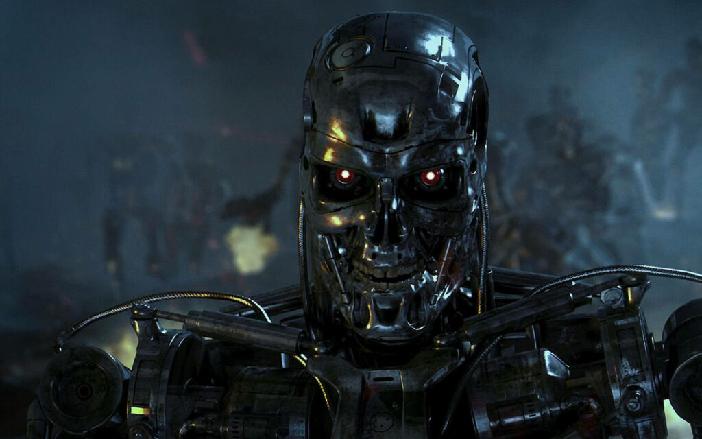 Terminator T800 metallic endoskeleton with glowing red eyes on dark battle-scarred background Wallpaper