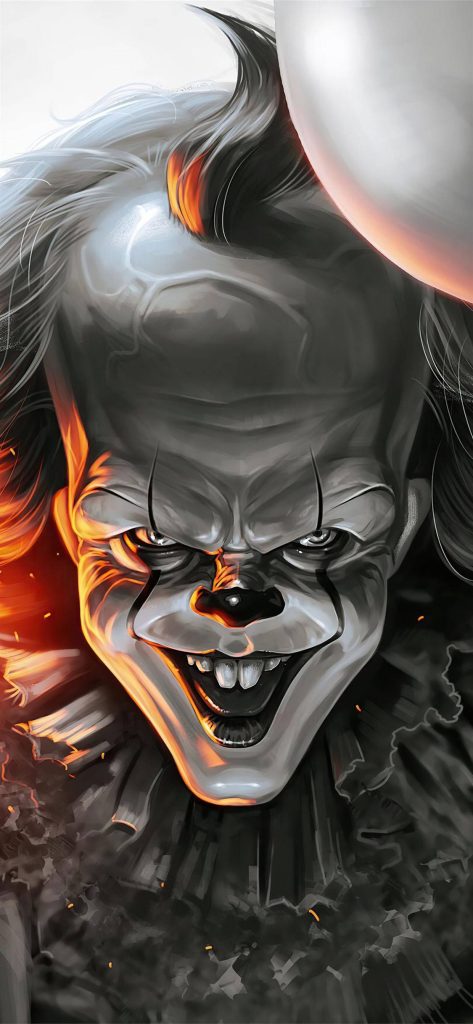 Pennywise IT clown iPhone wallpaper with fiery lighting and menacing expression background
