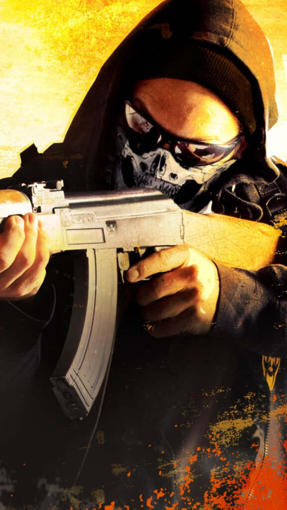 Explosive Gaming: Immersive Counter-Strike CSGO Wallpaper Depicting a fearsome Terrorist wielding an AK47