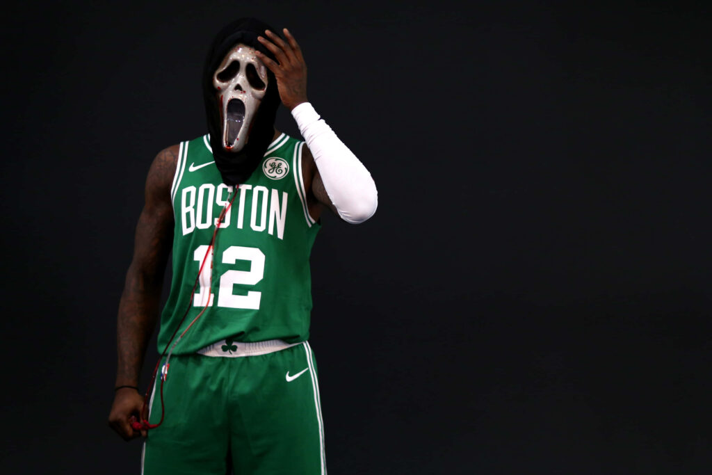 Terry Rozier in Celtics jersey number 12 wearing Scary Terry Scream mask dark basketball wallpaper