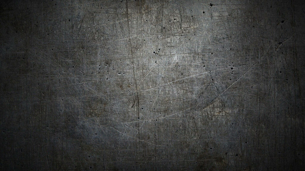 Dark grey industrial wallpaper with textured scratches and moody vignette for rugged depth