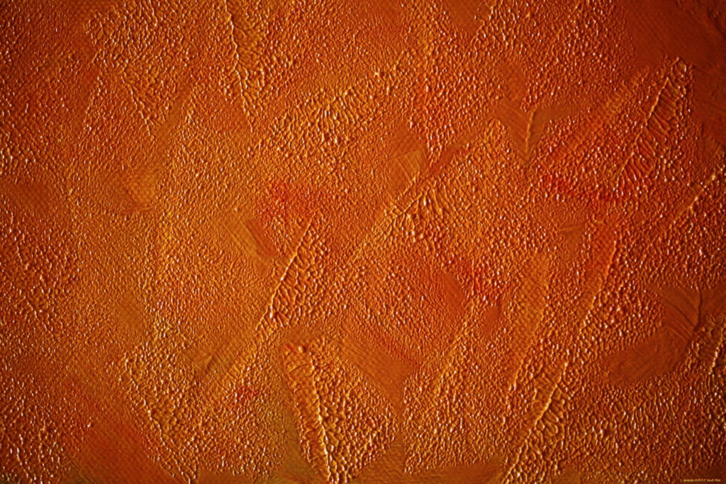 Vibrant Textured Orange Wallpaper Background with Artistic Patterns