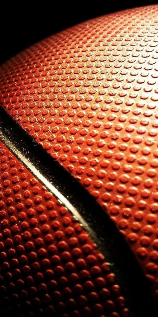 Dynamic Basketball Texture Wallpaper: Close-Up of Sporty Design