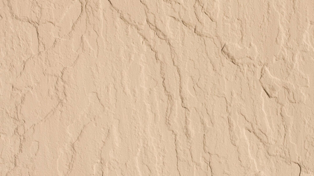 Textured Beige Wall Close-Up: Natural Patterns for Wallpaper Background