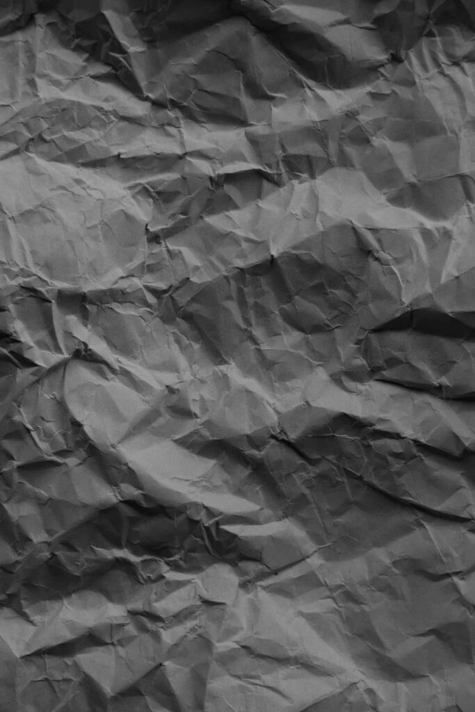 Textured Black Paper Wallpaper: Crumpled, Folded Rustic Background