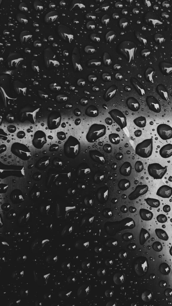 Close-Up Black and White Water Droplets Wallpaper - Textured Background