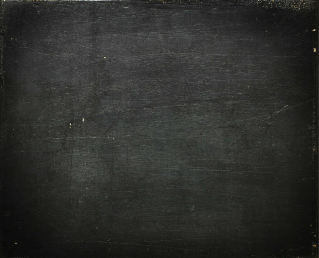 Textured Black Slate Wallpaper with Subtle Chalk Dust Smudges