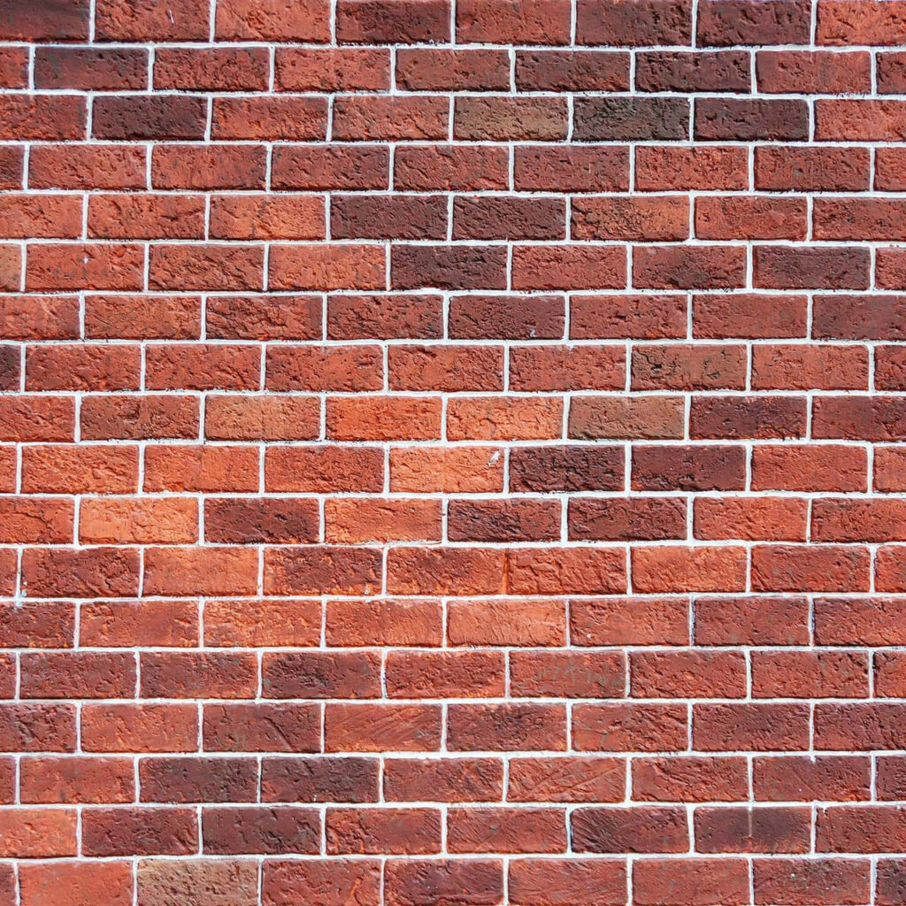 Textured Brown Brick Wallpaper Background with Depth & Character
