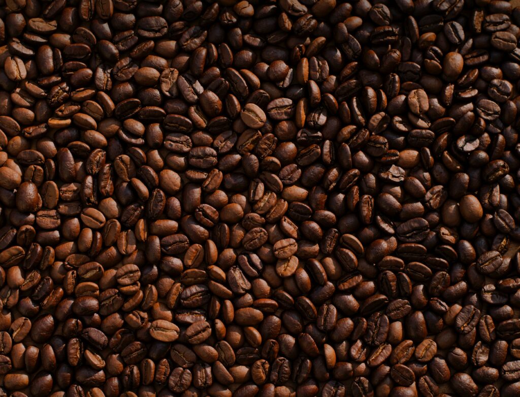 Warm Coffee Bean Wallpaper: Rich Textured Background in Brown Tones