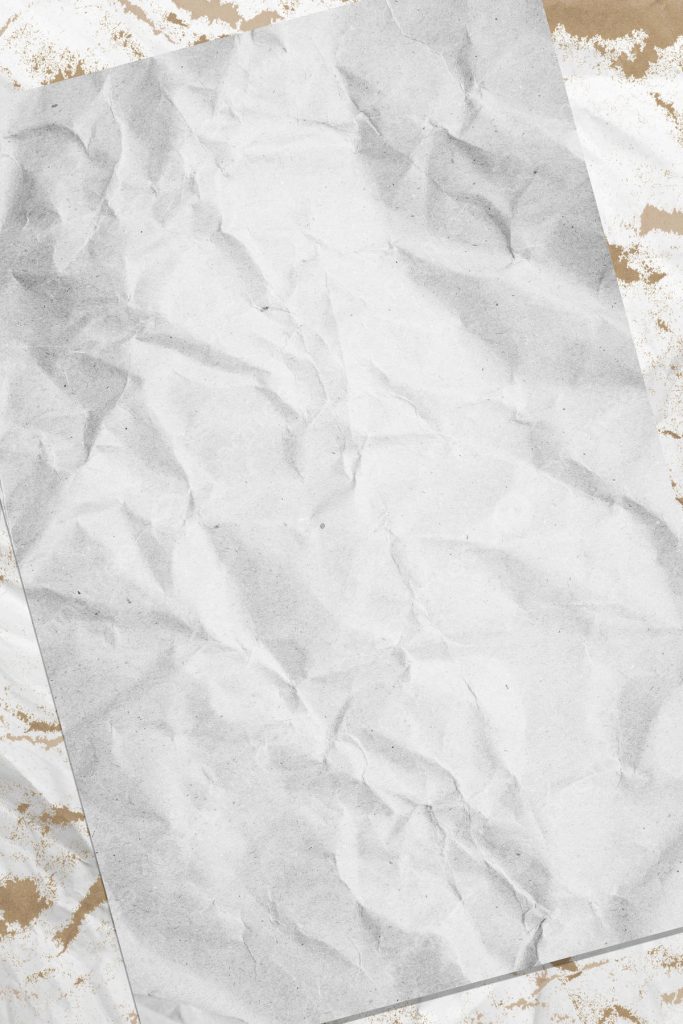 Textured crumpled white paper on rustic brown kraft paper background vintage desktop wallpaper