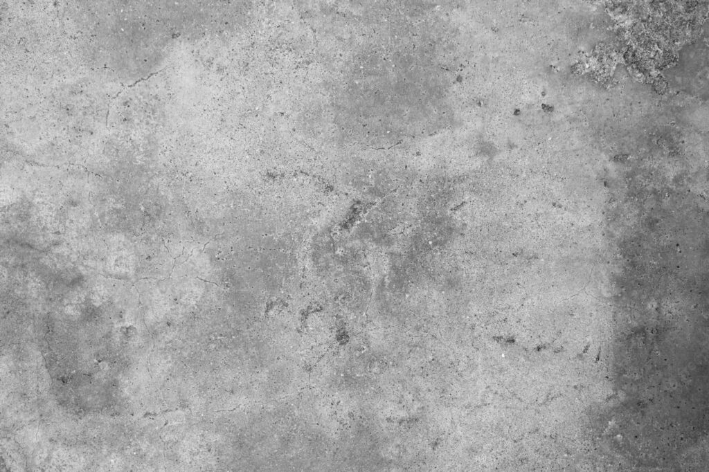 Textured Grey Concrete Wallpaper Background with Fine Cracks