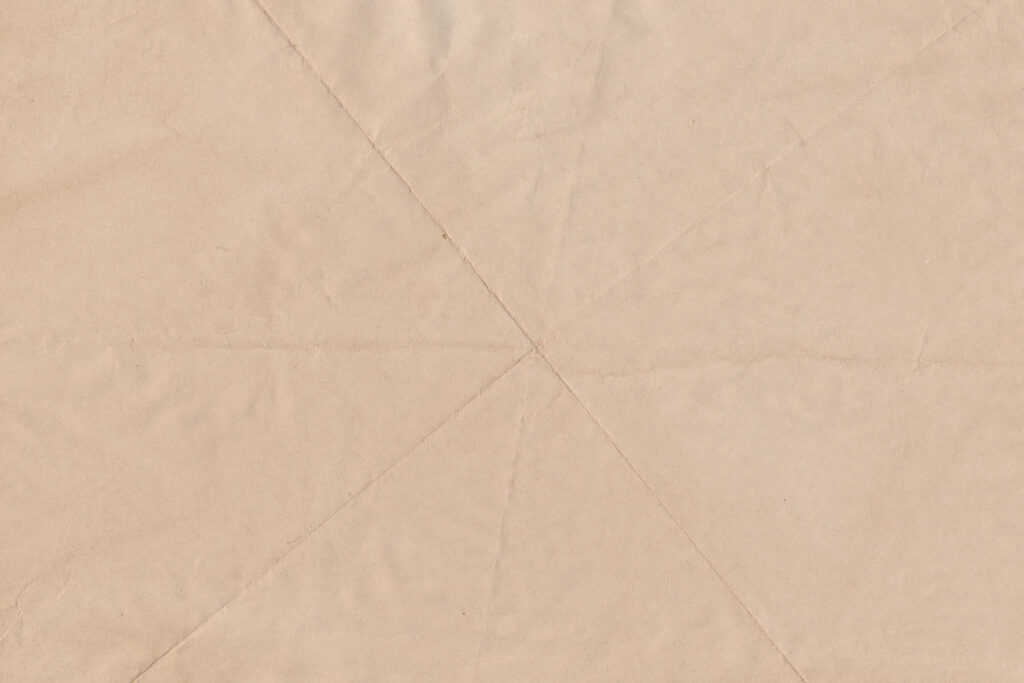 Vintage Textured Parchment Wallpaper with Subtle Line Patterns