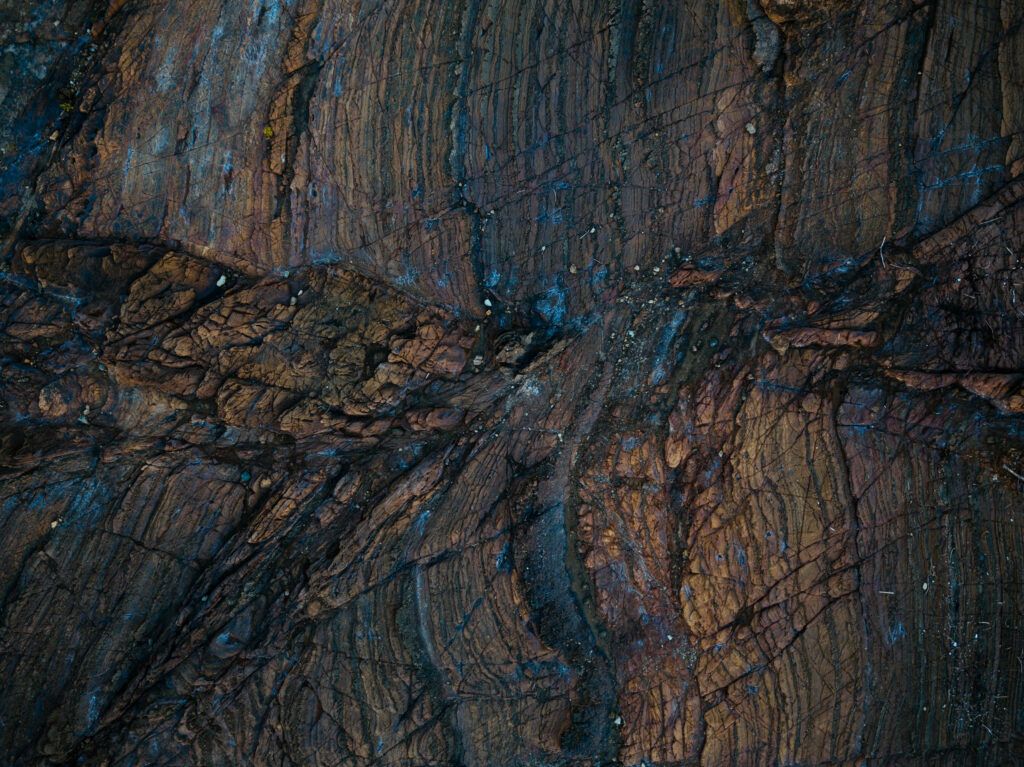 Textured Wallpaper with Layered Rock Patterns - Earthy Background